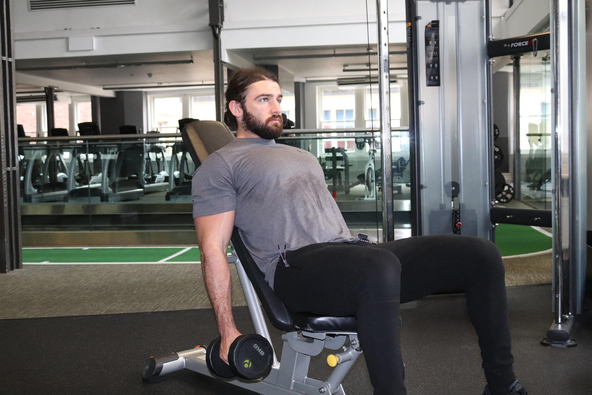 Man Doing Seated Hammer Curl